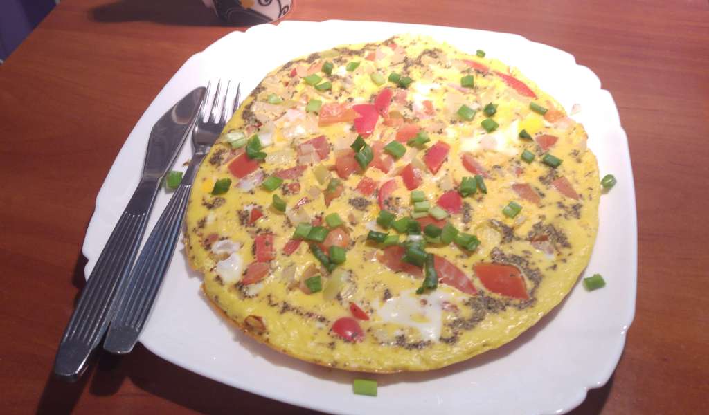 Cooked vegetable omelette on a plate