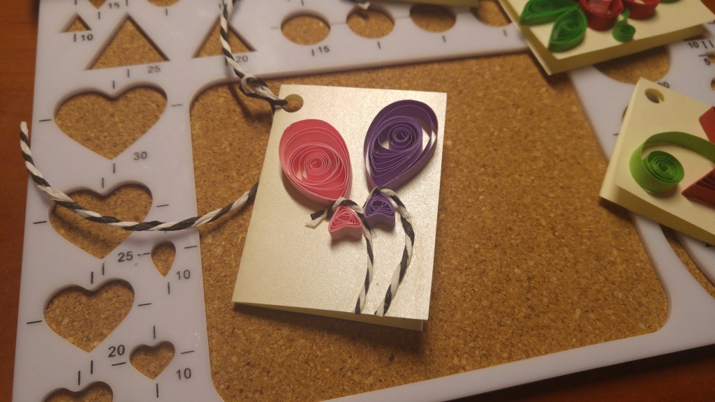 A handmade gift tag - balloons - quilling