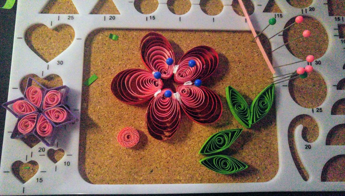 A DIY card in progress - red and pink quilling