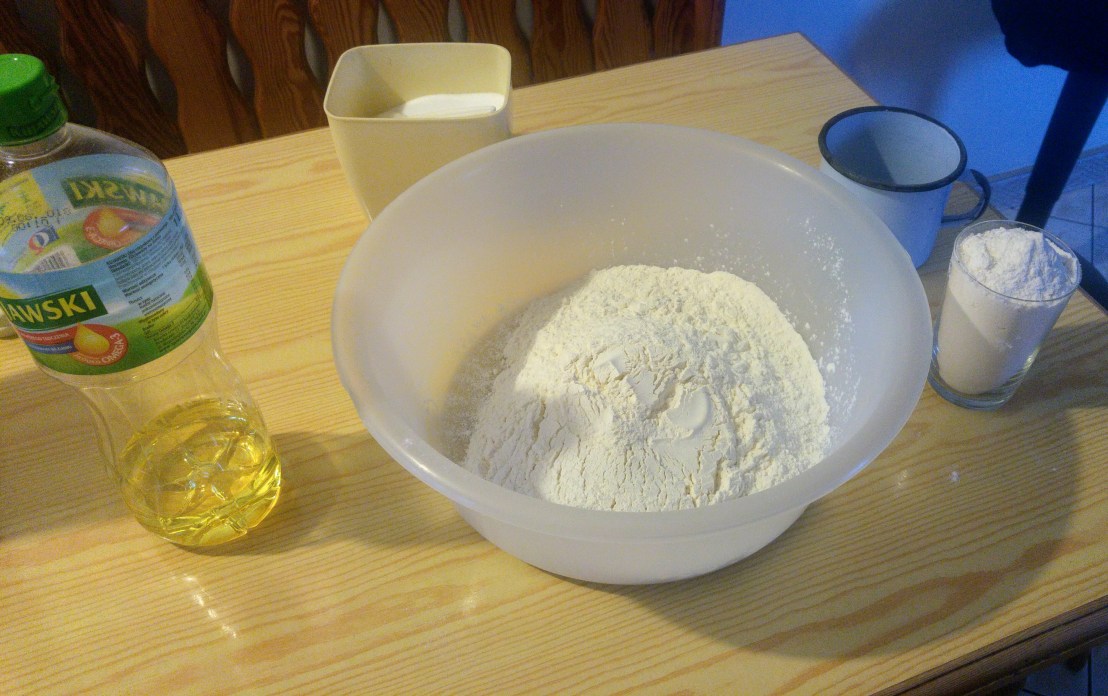 Ingredients for a thick crust pizza - flour in a bowl