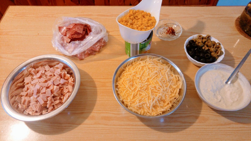 Ingredients for a thick crust pizza - ham and cheese