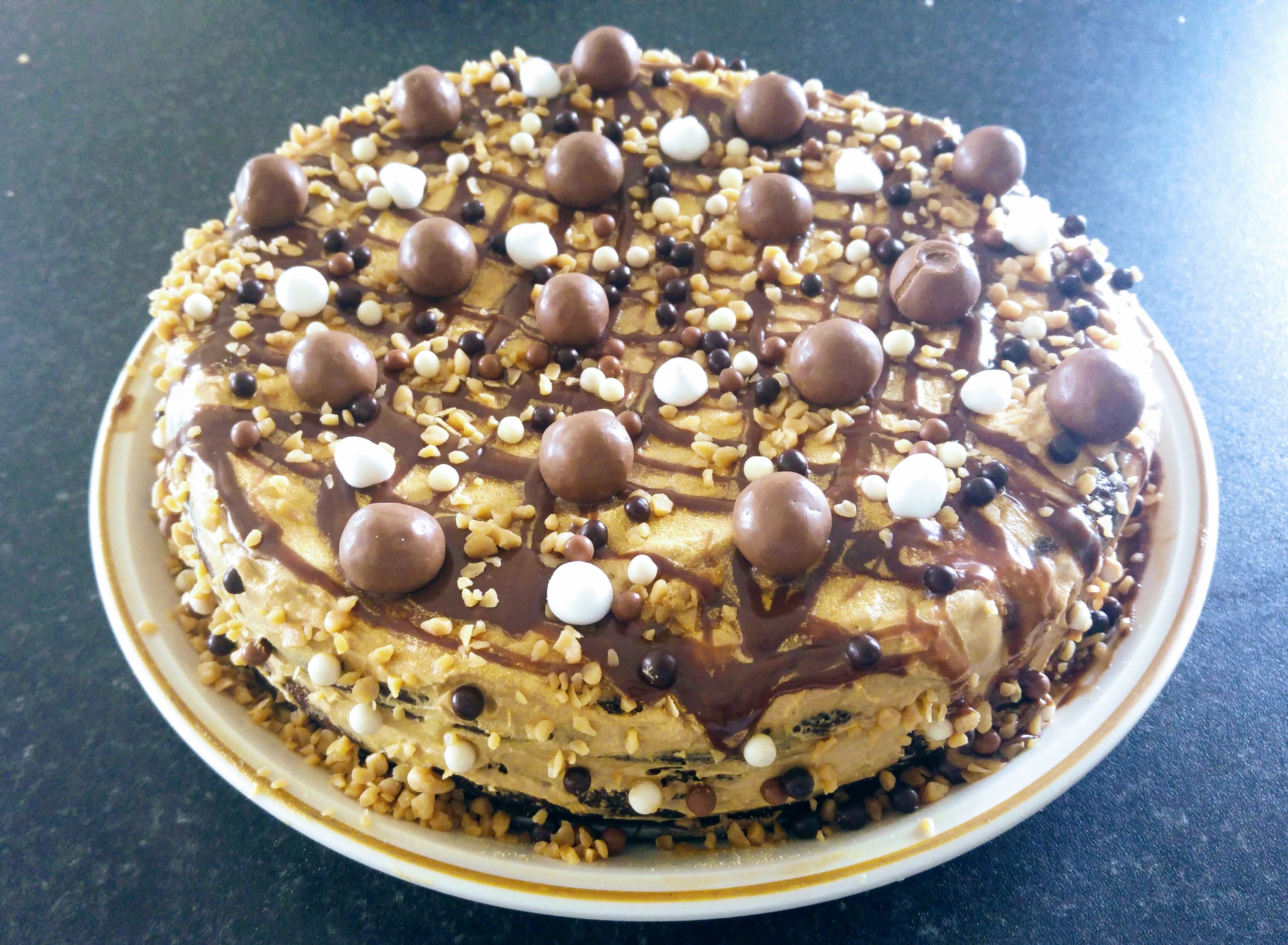 Coffee and Nutella cake, decorated, on a plate