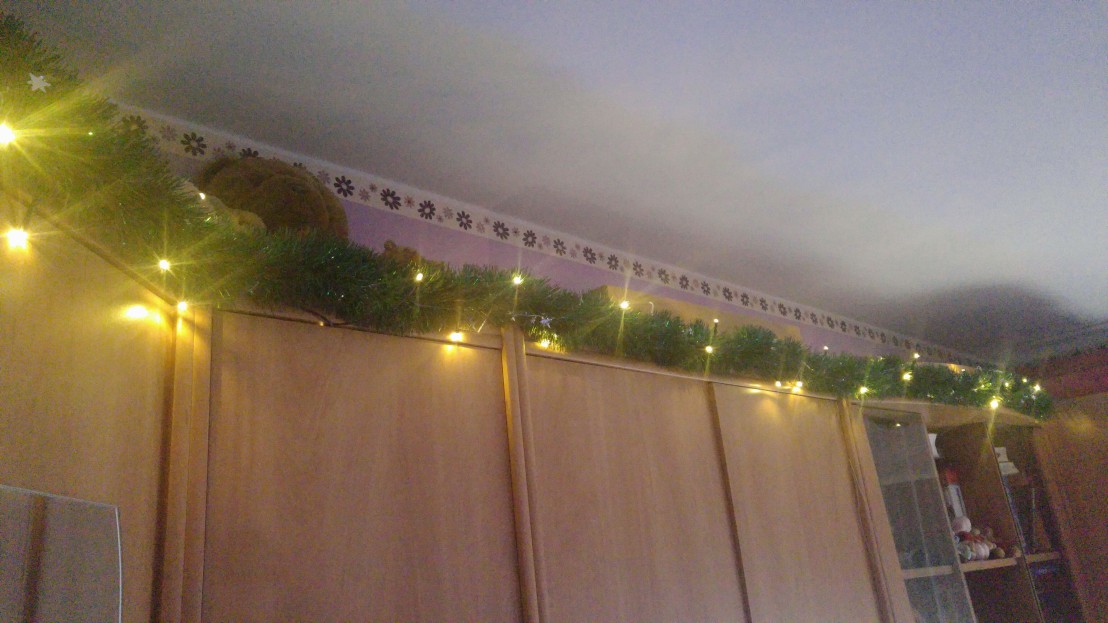 Finished garland on top of furniture with yellow lights