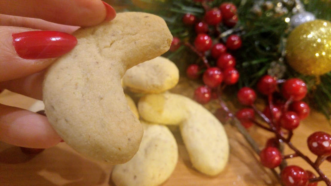 A baked almond crescent cookie