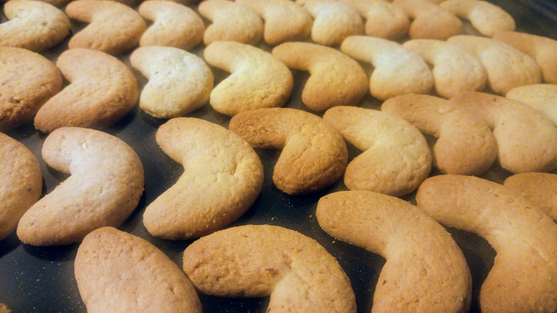 Freshly baked almond crescent cookies