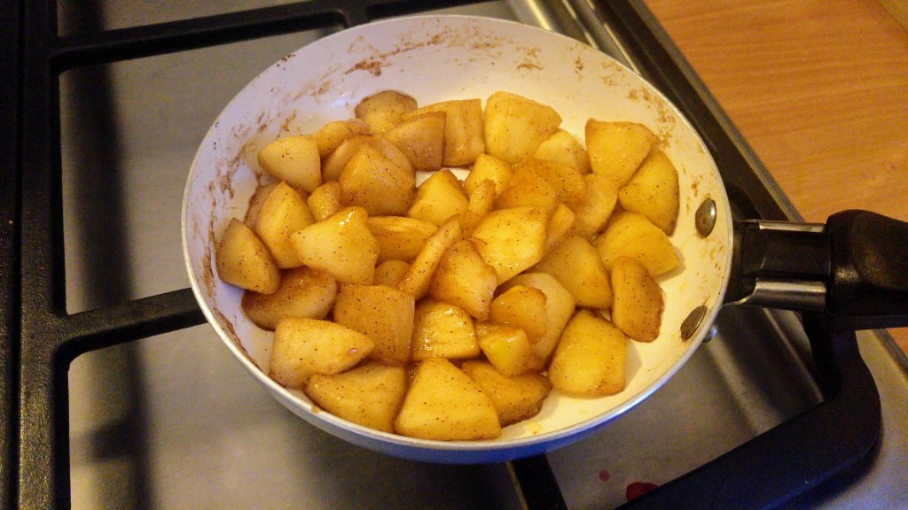 Caramelized apples on a frying pan