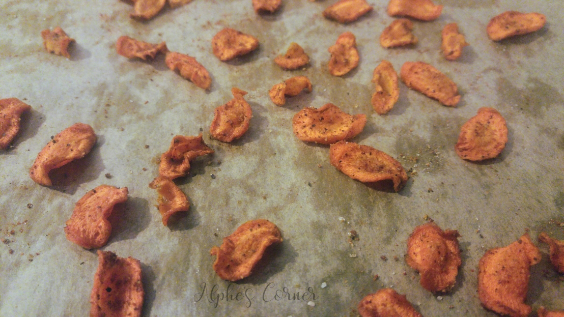 Baked carrot crisps on a baking tray