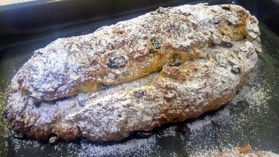 Baked Christstollen dusted with icing sugar