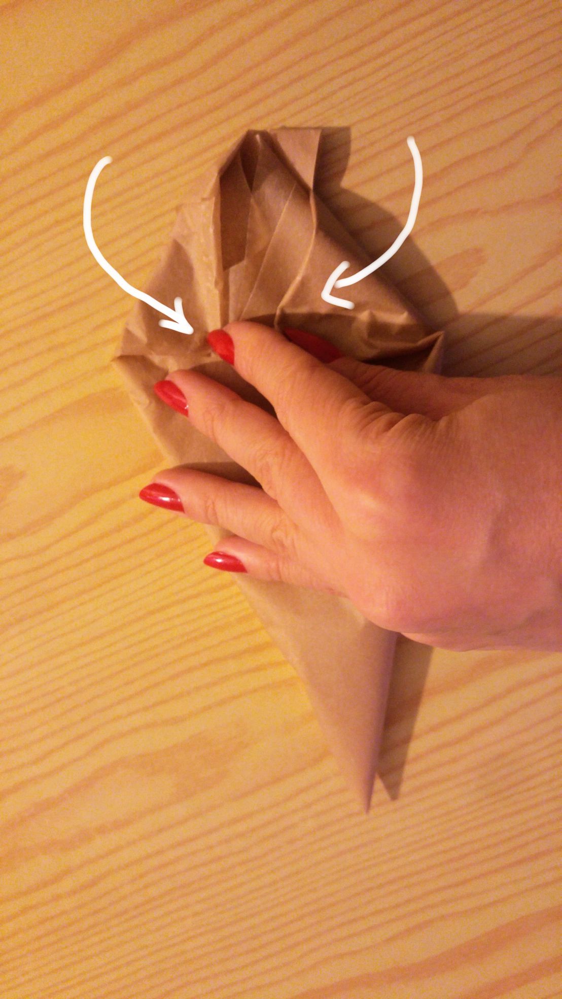 Closing the filled DIY piping bag