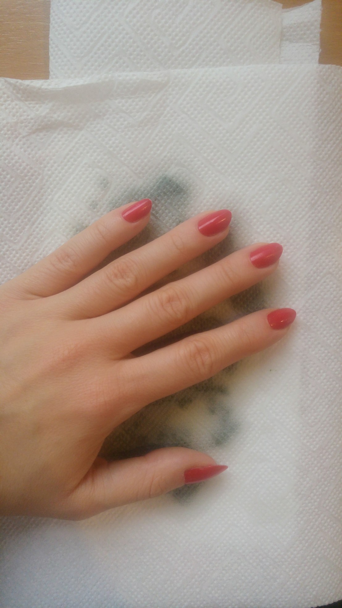 Pressing coloured chocolate paste between paper towels