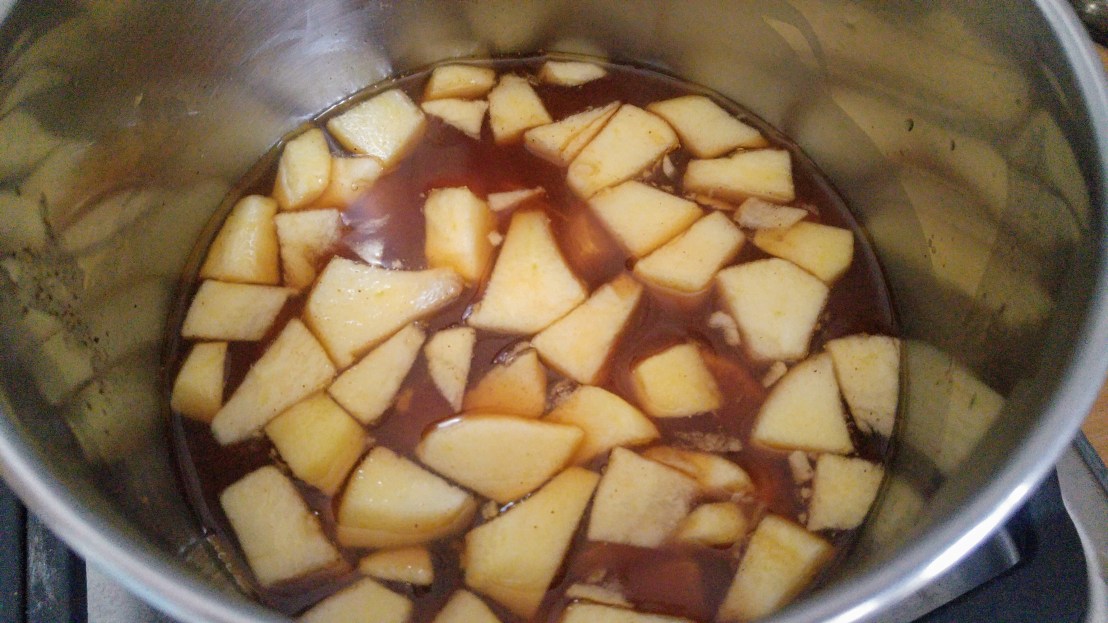 Cooking mulled tea in a pot