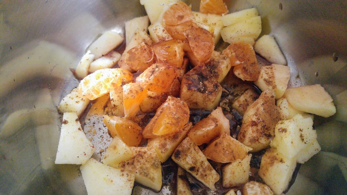 Ingredients for a mulled tea in a pot