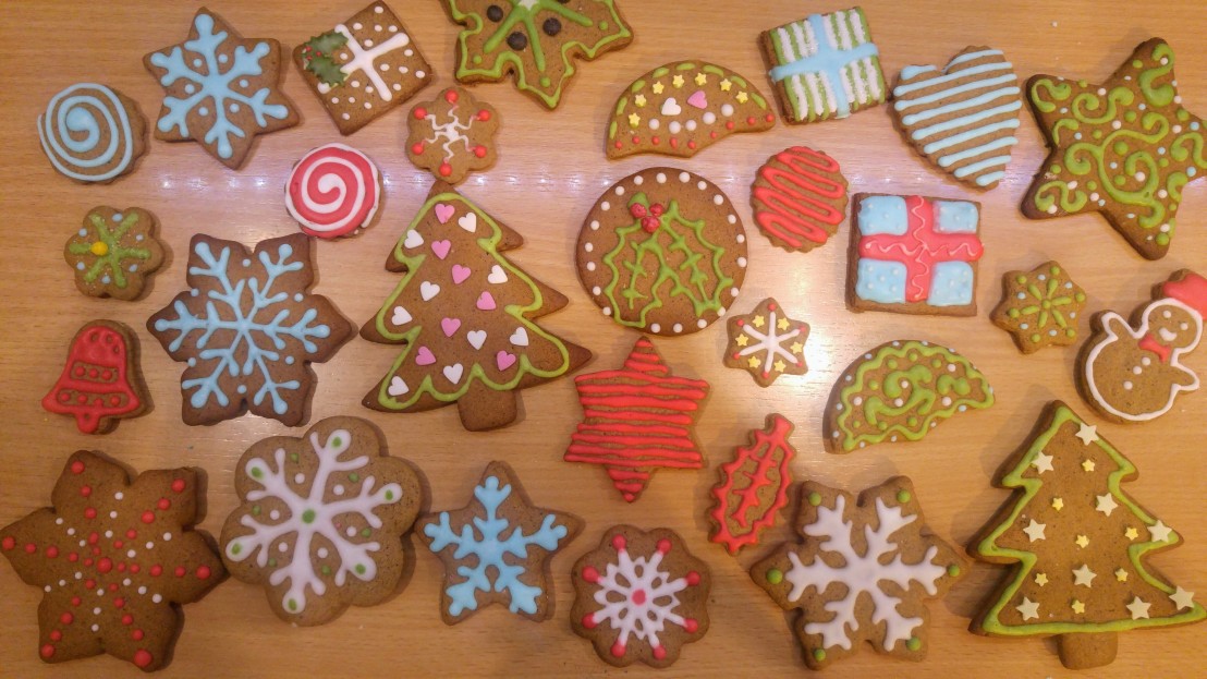 Gingerbread cookies decorated with coloured royal icing