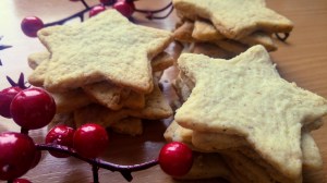 A few piles of star shaped Christmas walnut cookies