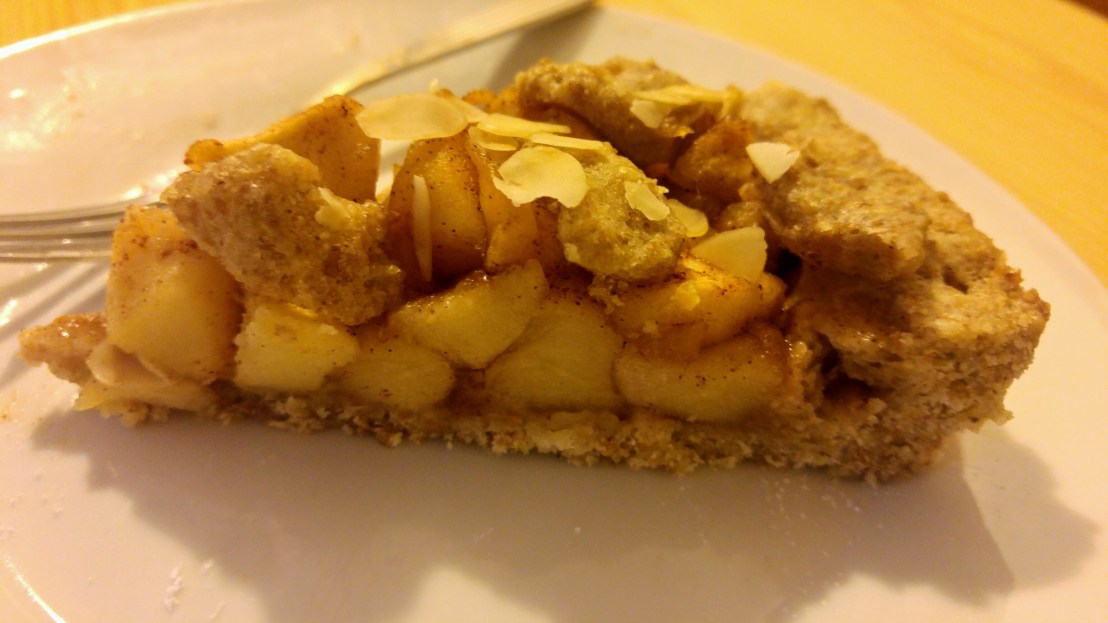 A slice of wholemeal apple tart on a plate