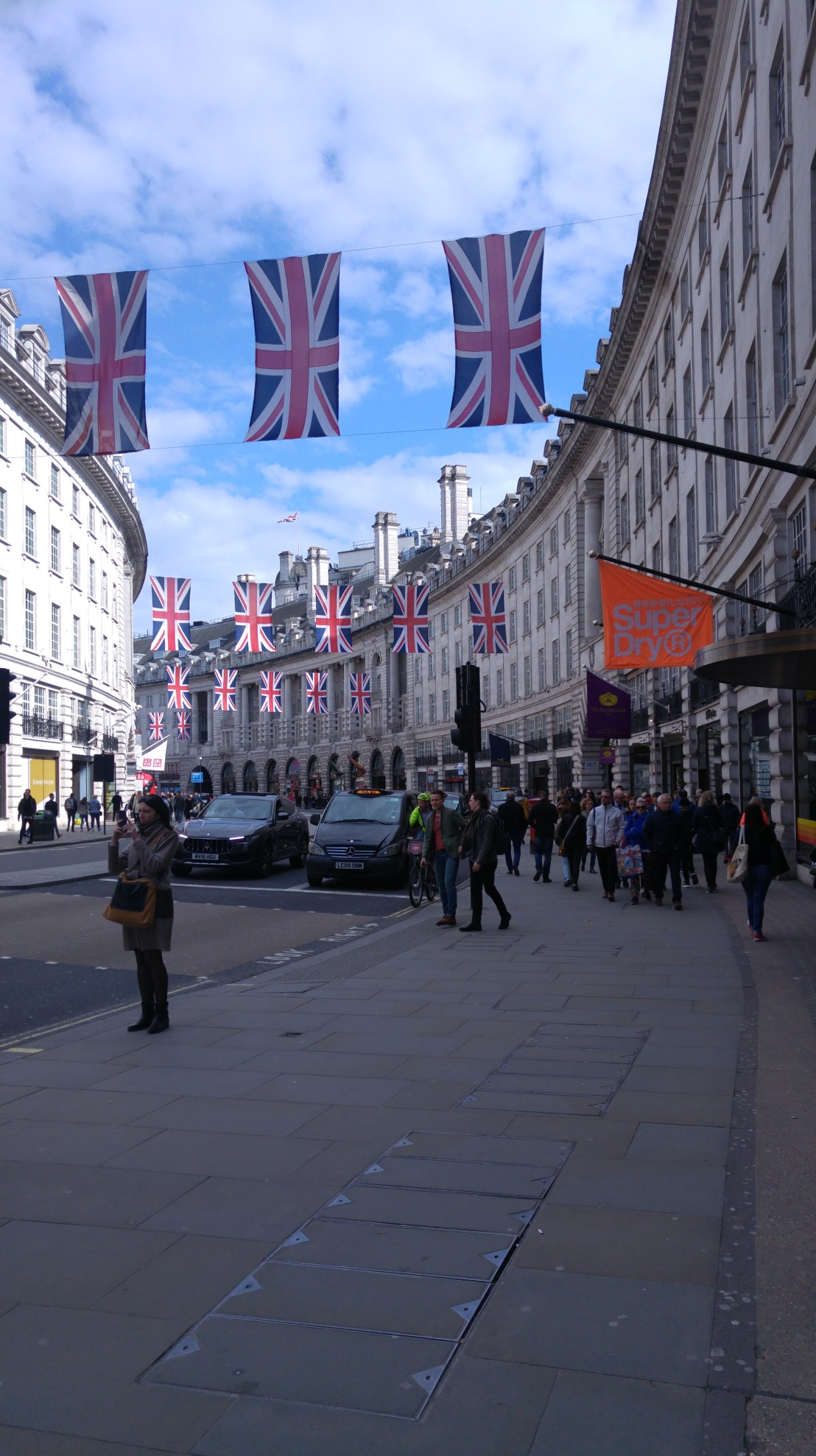 London trip - a street with many British flags