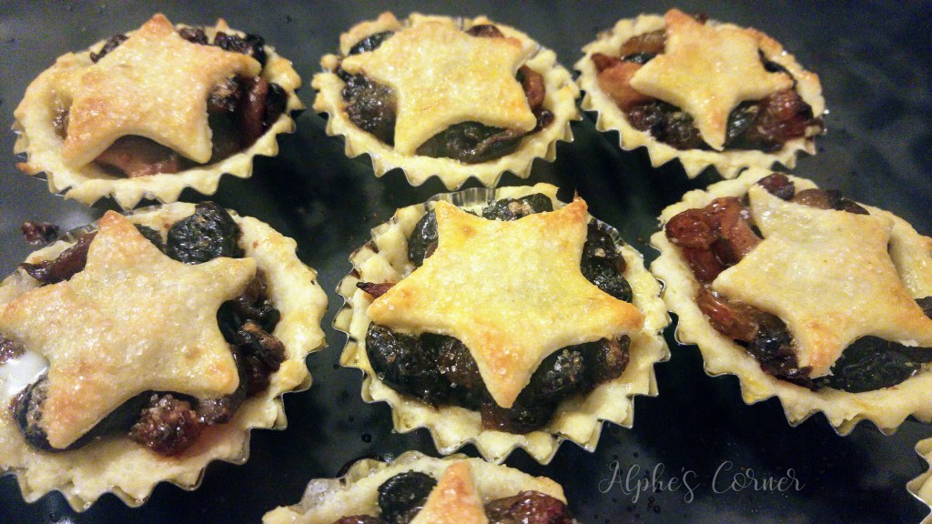 Baked mince pies on a baking tray