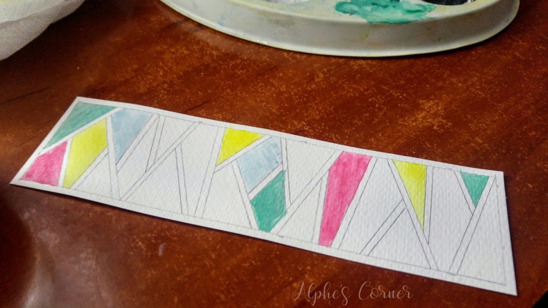 Filling the geometric pattern with watercolours