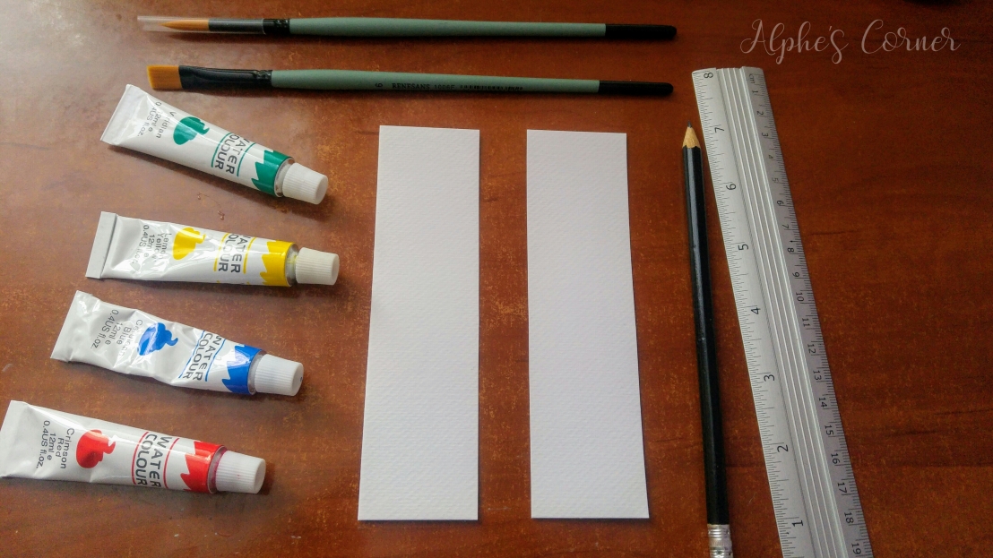 Blank bookmark, a pencil, ruler and watercolour paints
