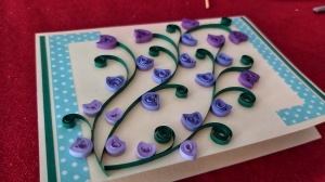 Small purple flowers - handmade quilled card