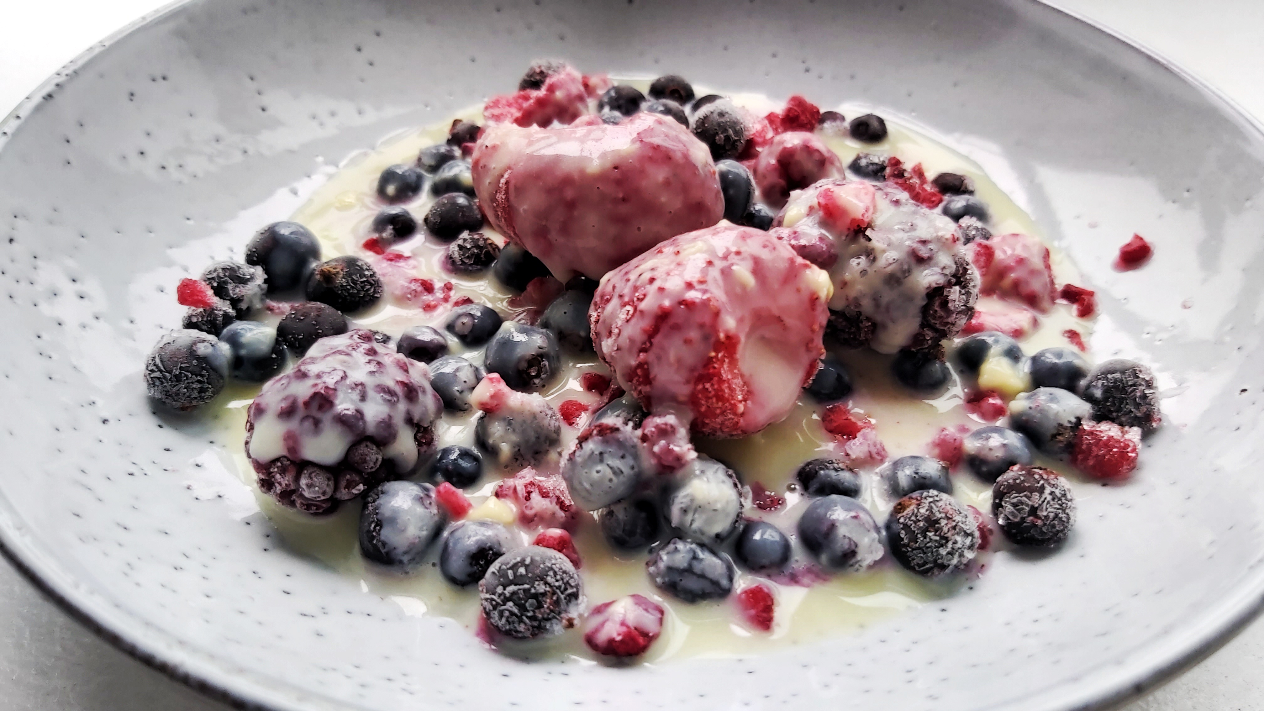 Iced Berries with white chocolate, view from the side