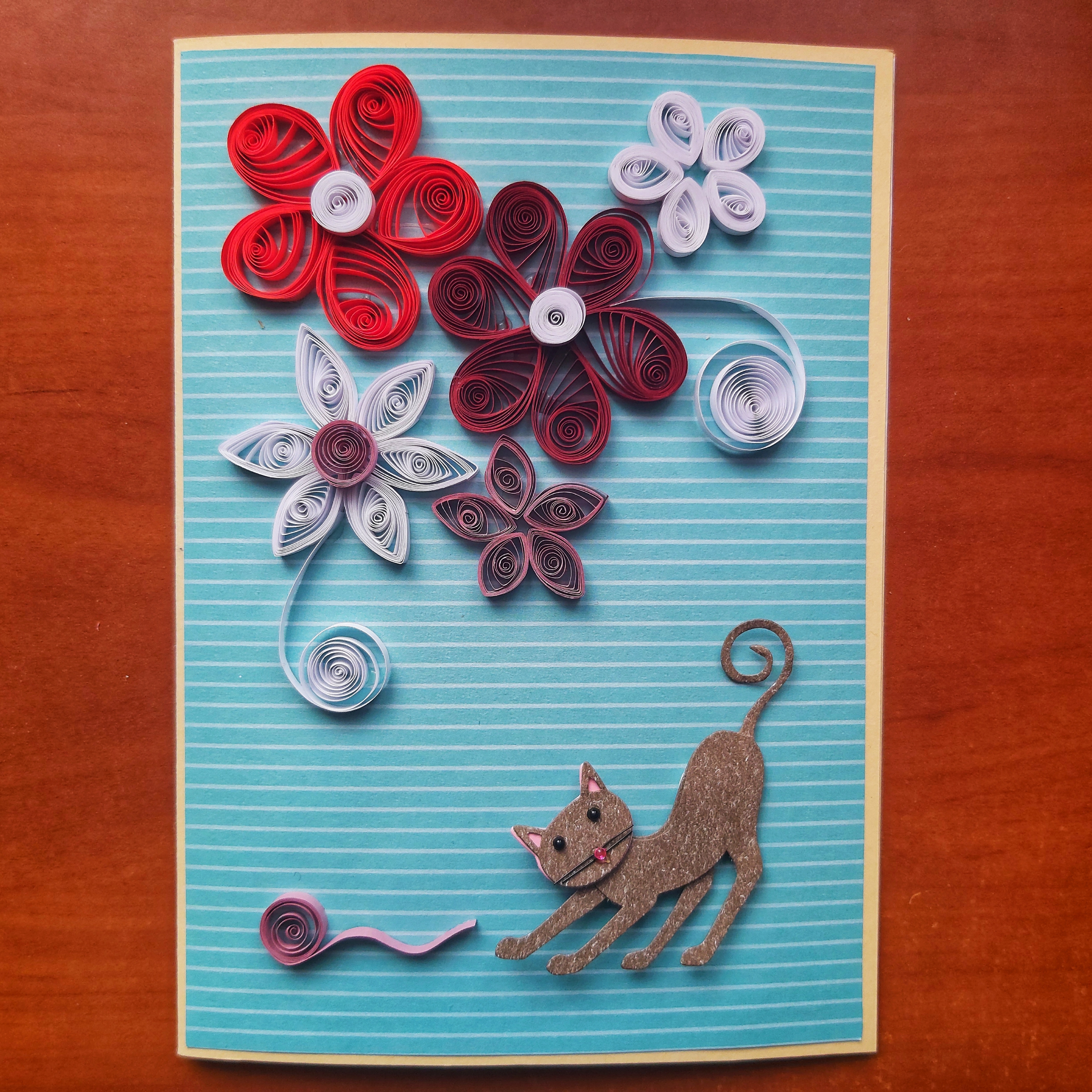 Handmade quilling card - cat with flowers