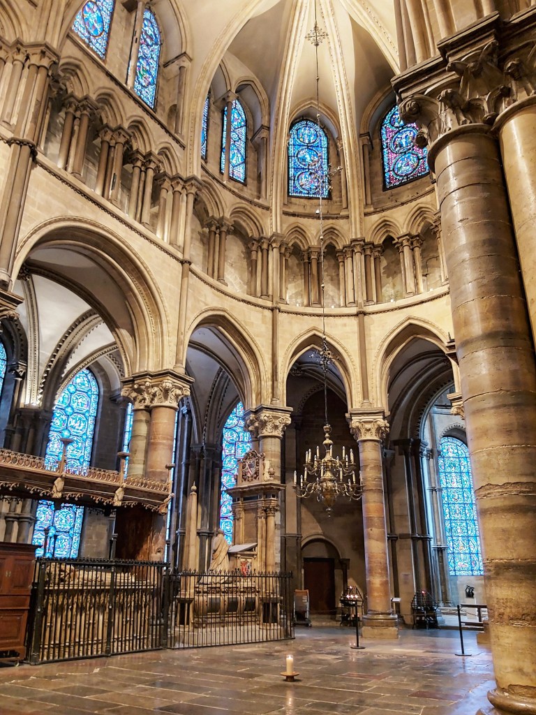 The inside of Canterbury Cathedral. Marble columns and arched ceiling.