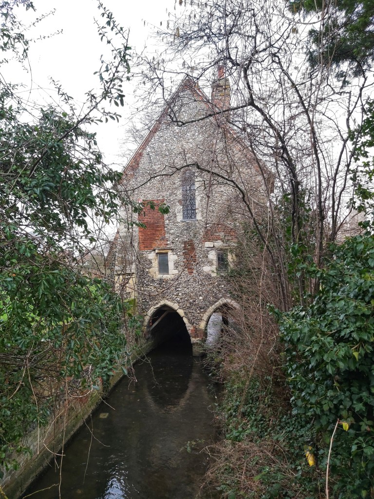 Greyfriars Chapel in Canterbury in the Franciscan Gardens. A small, brick building built over the river.