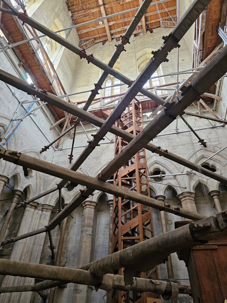Wooden stairs and balcony inside the tower of Salisbury Cathedral.