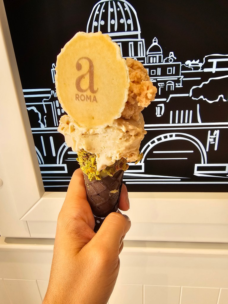 A sweet cone with two scoops of ice cream