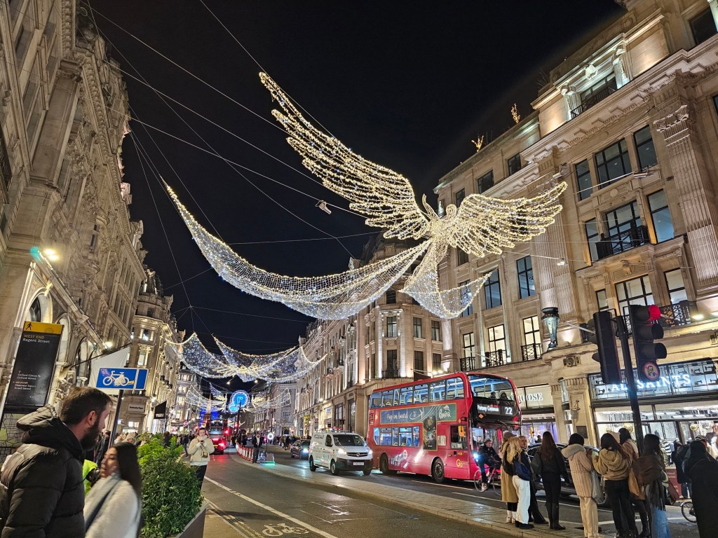 Fairy light illuminations in the shape of angels over Regent Street in London.
