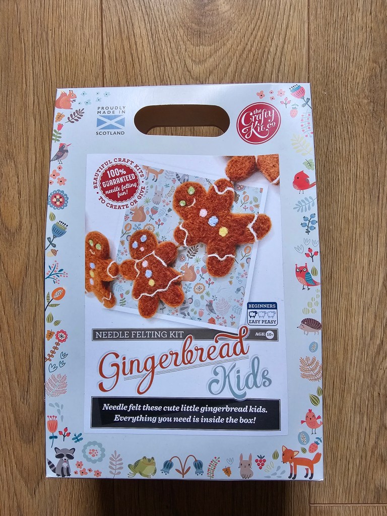 DIY box kit for creating needle felted gingerbread men.