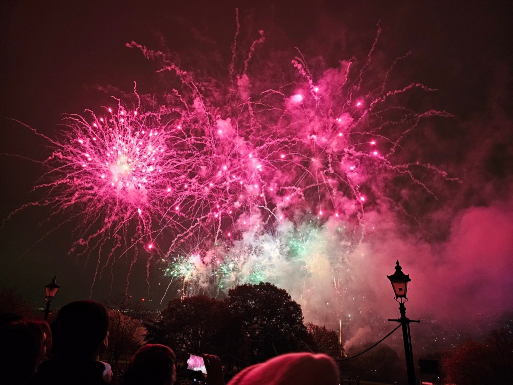 Red fireworks during London Alexandra Palace Fireworks 2024.