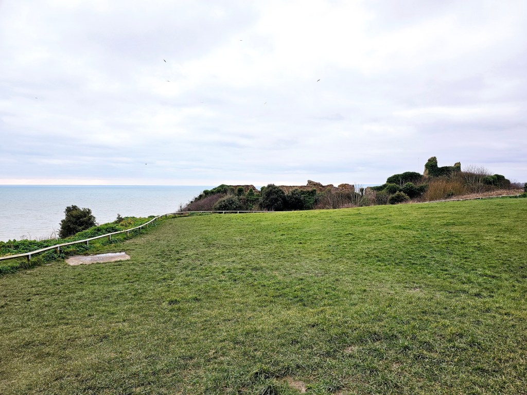 The top of West Hill in Hastings, with the ruins of Hastings Castle visible in the background.