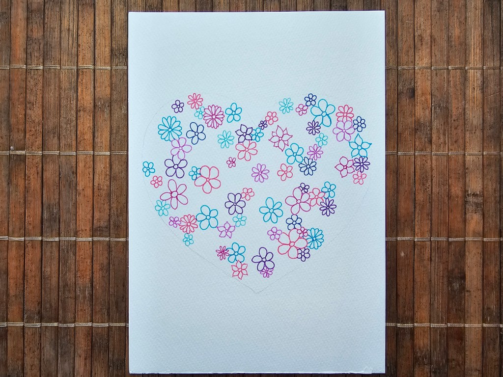 Blue and orange flowers are also drawn inside the heart.
