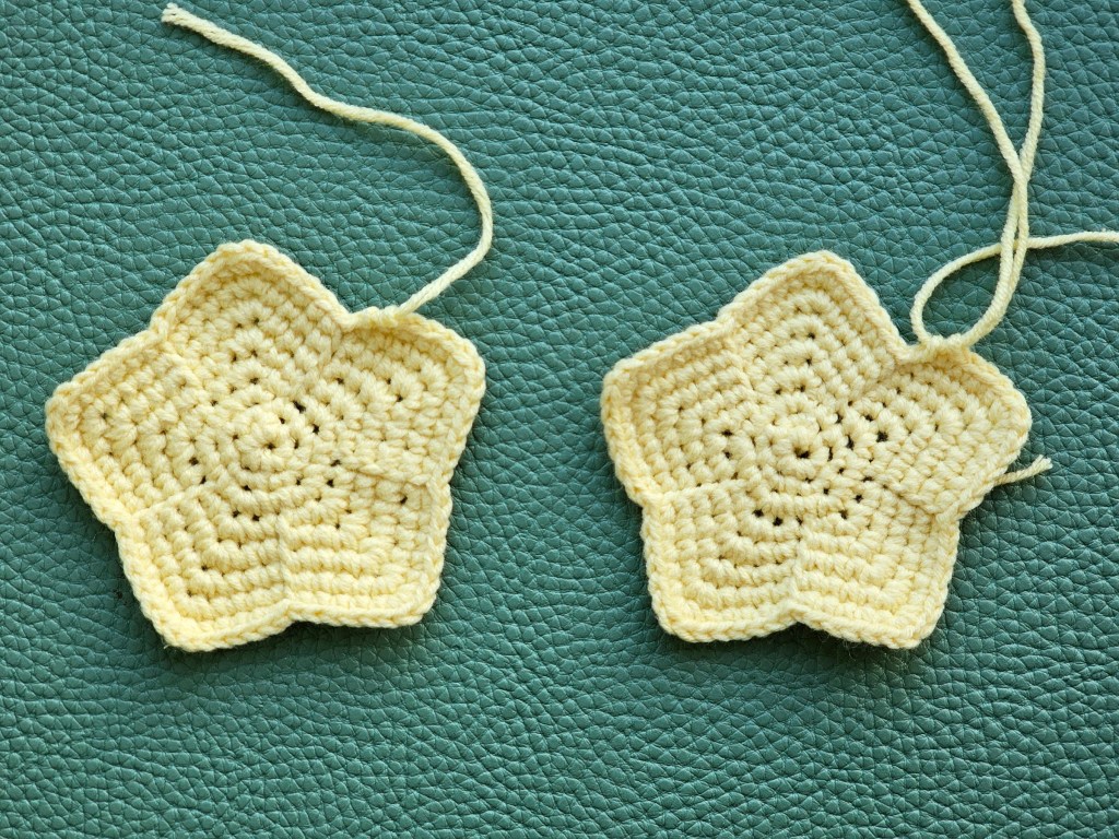 Two crocheted small stars.