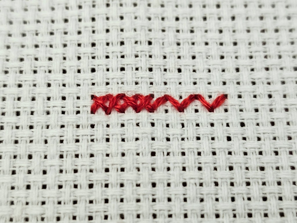 Cross stitches which go in various directions