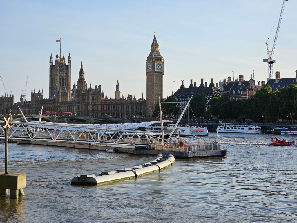 The Big Ben and the Palace of Westminster seen from across the Thames.