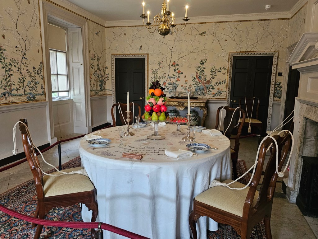 The dining room with a Chinese wallpaper at Marble Hill, London