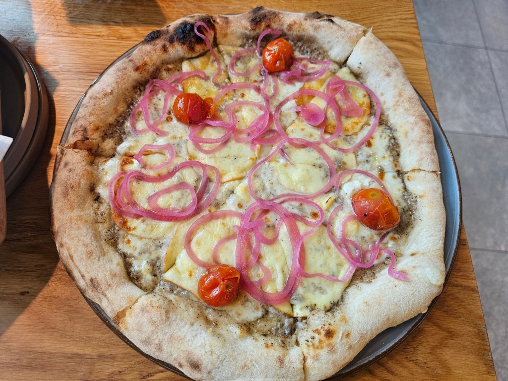 Pizza with smoked cheese in Gwarno restaurant