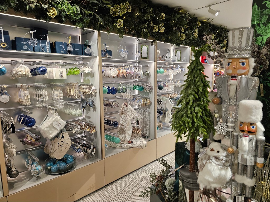Shelves full of Christmas ornaments in Harrods, London