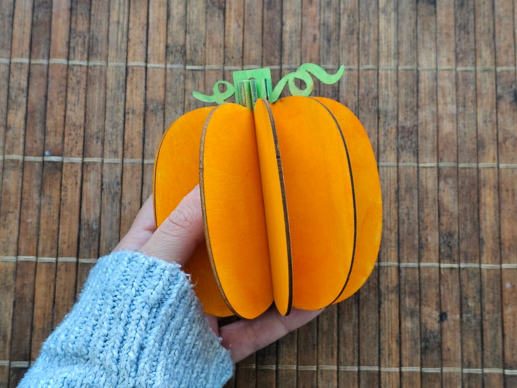 Assembled wooden pumpkin ornament, painted without elaborate shading