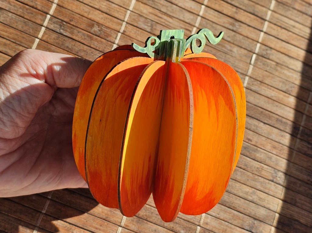 Assembled wooden pumpkin ornament, painted with extra shading