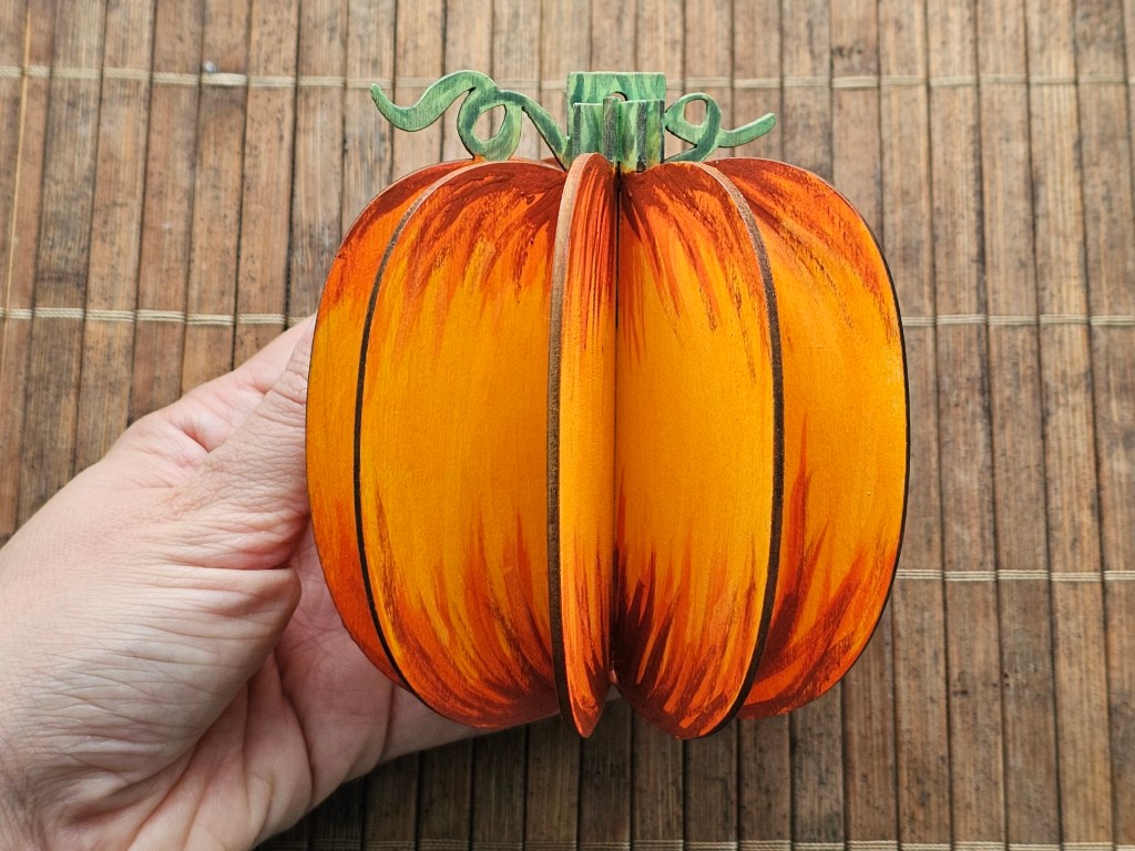 Assembled wooden pumpkin ornament, painted with extra shading