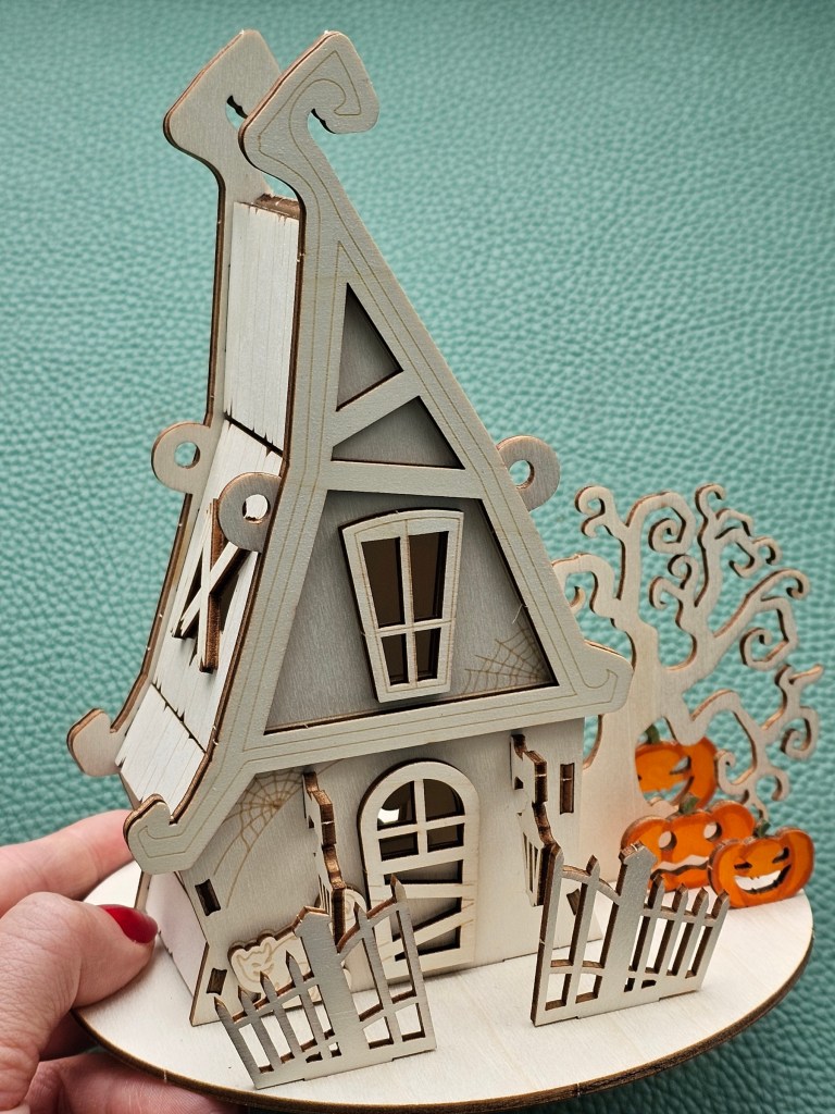 Assembled wooden haunted Halloween house.