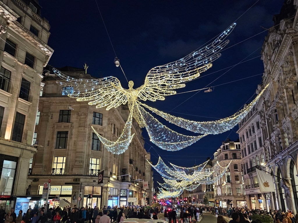 Hanging angel Christmas illuminations on Regent Street, London