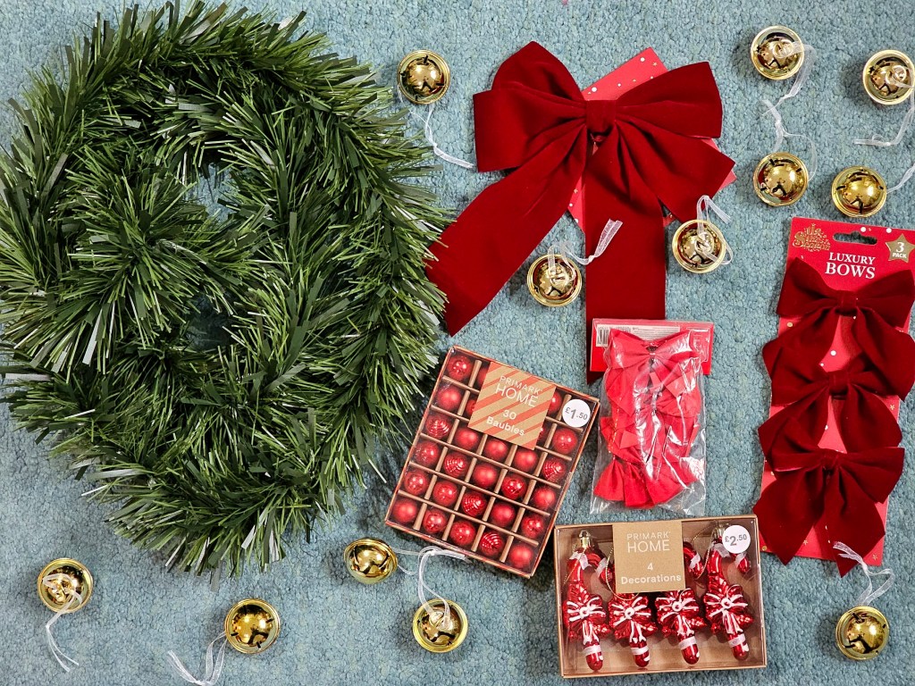 Blank Christmas garland tinsel and loads of baubles and bows in various shapes