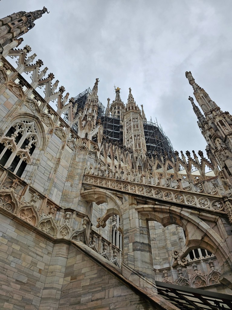 The rooftop terraces of Duomo di Milano in the rain