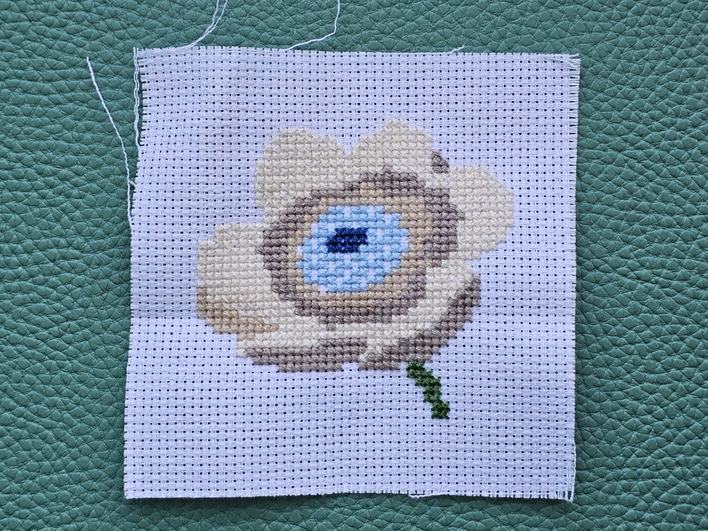 Nearly finished cross stitch anemone.
