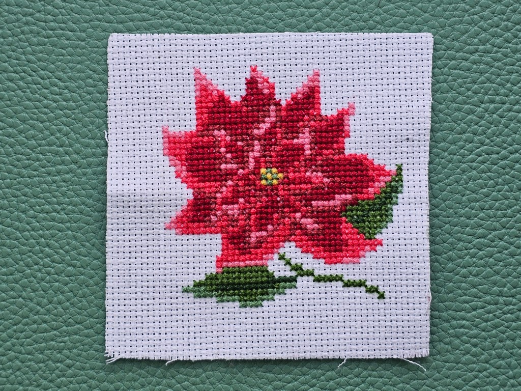 Completed cross stitch poinsettia